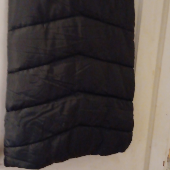 Woman's Long Hooded Puffer Vest - Picture 4 of 4